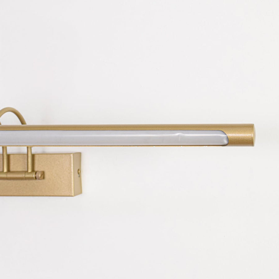 Closeup of gold metal wall mounted picture light showcasing smooth finish sturdy base plate and elegant linear arm.