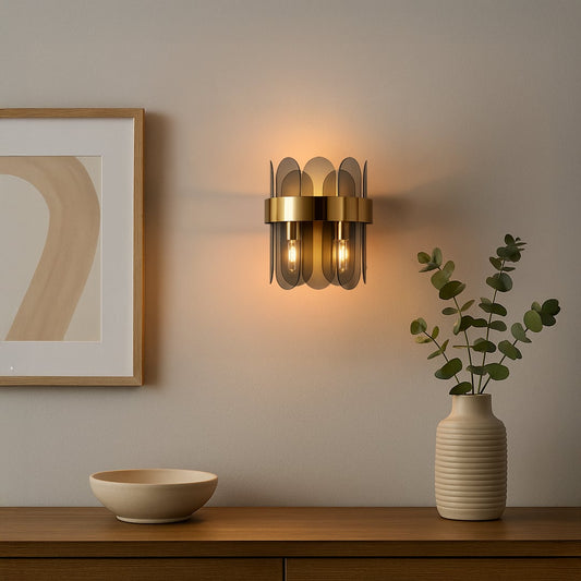 A modern metal and smoked glass wall light glowing warmly in a stylish living room setting ideal for hallway or bedroom ambient lighting.