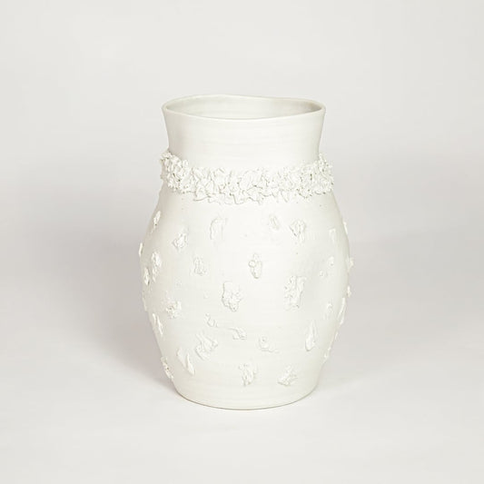 Classic white ceramic flower vase with ornamental texture perfect for entryway table living room or dining decor display.