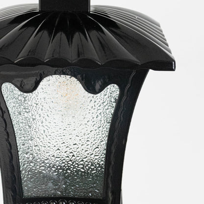 Classic hanging lantern light enhancing patio or entryway decor with a warm inviting glow and graceful design.