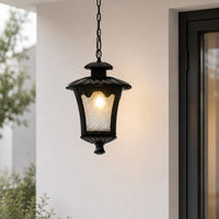Modern black metal outdoor hanging lantern for porch entrance balcony and covered patio with warm ambient lighting.