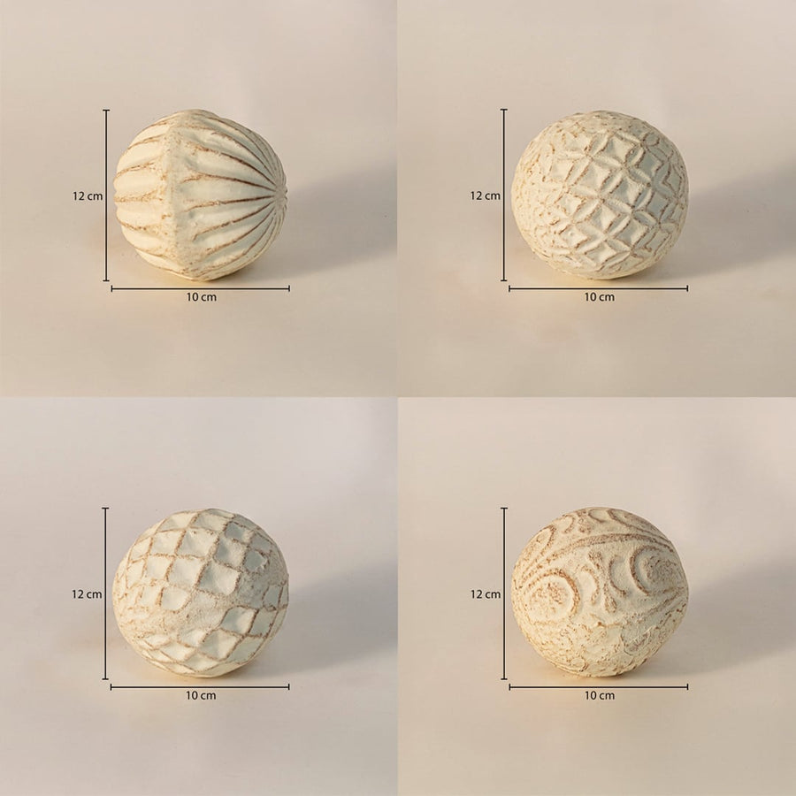 Textured ceramic balls set each ball measuring 12 cm in height and 10 cm in width - perfect for tabletop or bowl decor.