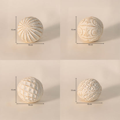 Decorative carved balls set each ball measuring approximately 12 cm tall and 10 cm wide - ideal for table decor or tray styling.