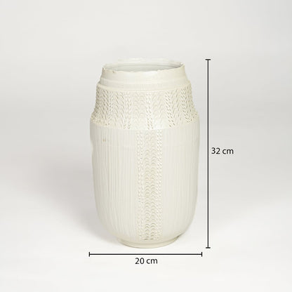 White ceramic textured vase measuring 32 cm height and 20 cm width ideal for elegant tabletop or floor decor placement.