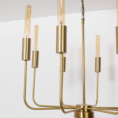 Detailed closeup of exposed vintage Edison tube bulb with brass gold cylindrical socket on contemporary chandelier curved arm.