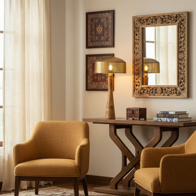 Artistic table lamp combining natural wood and golden metal creating an eye-catching accent piece ideal for modern home decor styling.