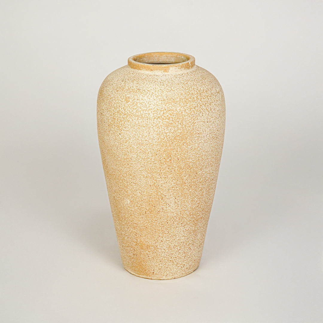 White background image of beige ceramic floor vase for elegant interior decor styling with textured matte finish.
