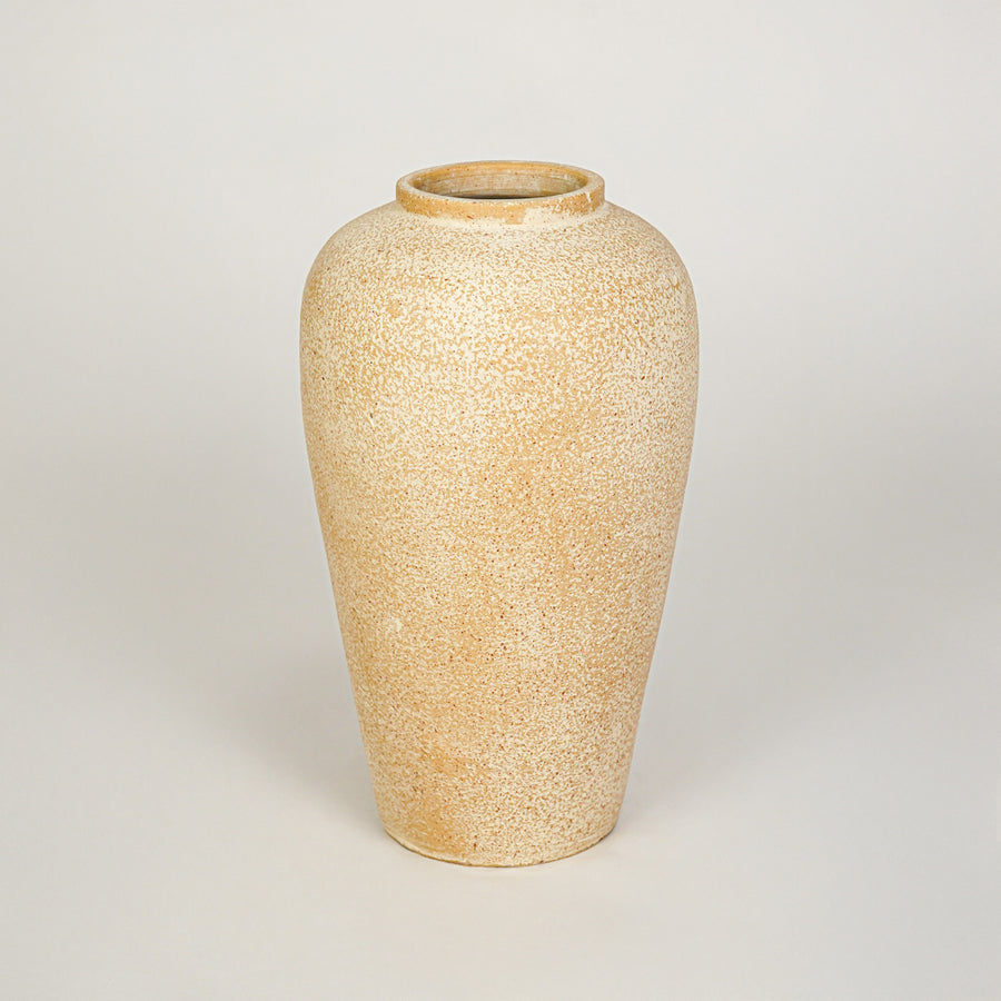 White background image of beige ceramic floor vase for elegant interior decor styling with textured matte finish.