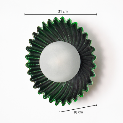 Wall light dimensions image showing 31 cm overall width and 18 cm globe size with green fluted metal backplate and centered frosted glass light.