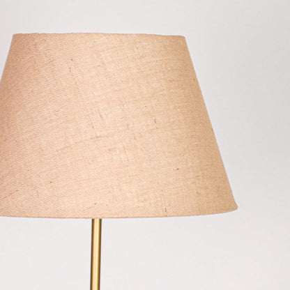 Closeup beige fabric tapered shade with natural linen texture for soft diffused lighting in elegant interior spaces Decor.