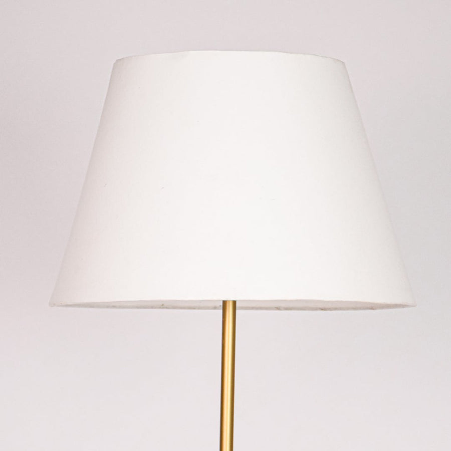 Wide tapered white fabric lampshade with smooth finish and soft curves designed for warm ambient lighting.