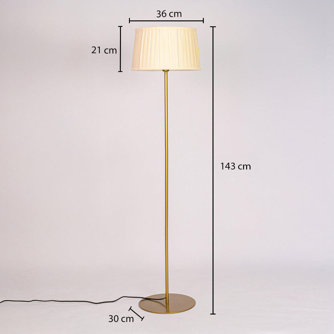 Gold floor lamp showing 143 cm height 36 cm shade width 21 cm shade height and 30 cm round base diameter.
