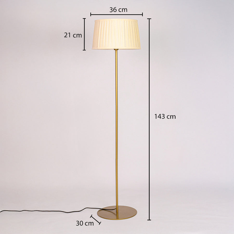 Gold floor lamp showing 143 cm height 36 cm shade width 21 cm shade height and 30 cm round base diameter.