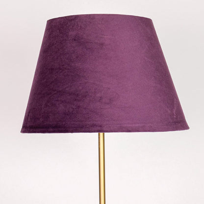 Closeup purple fabric tapered shade with smooth texture for soft diffused lighting in modern interior spaces Decor.