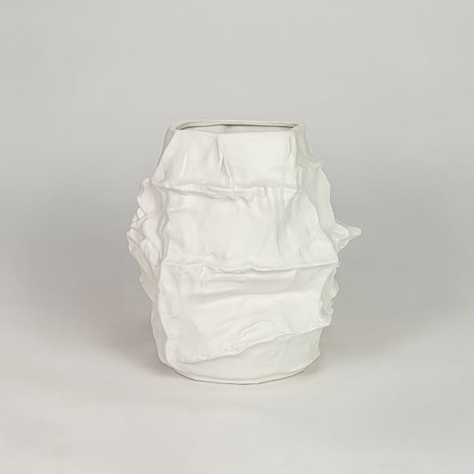 White ceramic decorative flower vase with textured finish modern vase for tabletop shelf console living room decor styling.
