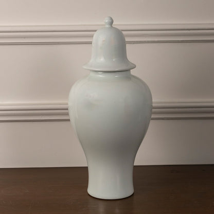 Classic ceramic ginger jar in glossy white finish with lid ideal for enhancing living room and entryway decor.