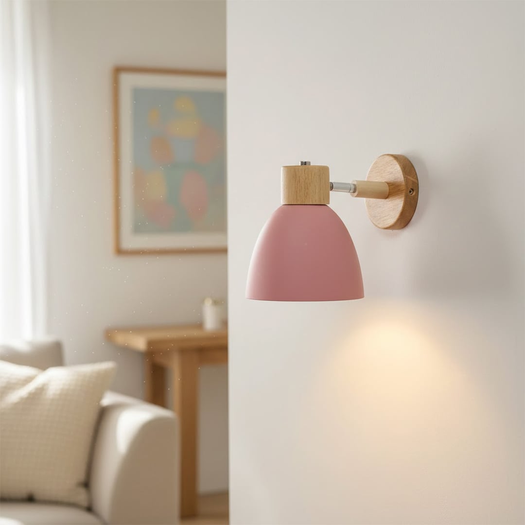 Modern pink wall light with wooden accents creating cozy ambient bedroom lighting decor.