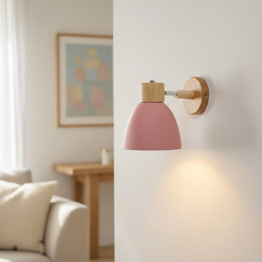 Modern pink wall light with wooden accents creating cozy ambient bedroom lighting decor.