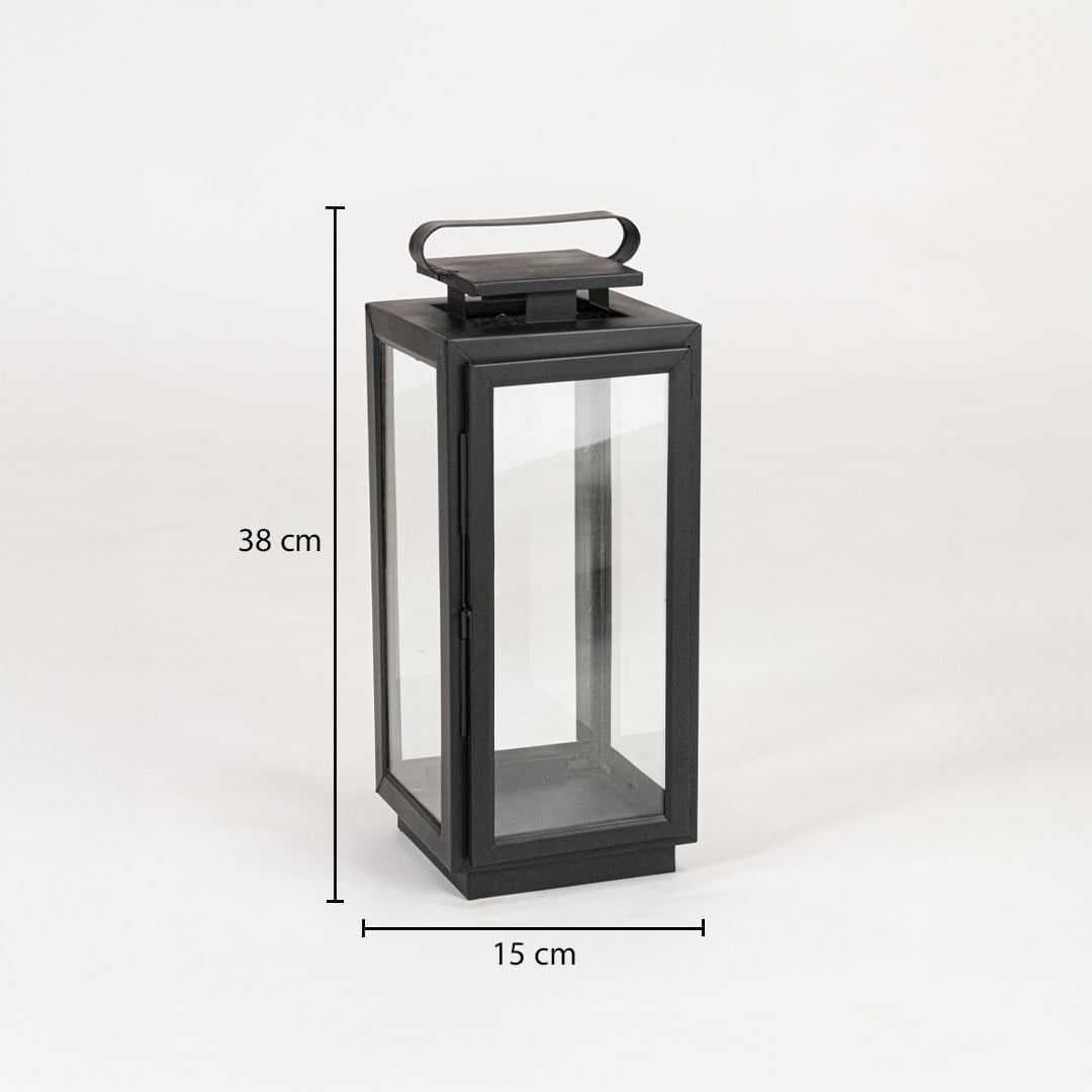 Black metal lantern with clear glass panels measuring 38 cm height and 15 cm width ideal for tabletop and floor Decor.