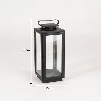 Black metal lantern with clear glass panels measuring 38 cm height and 15 cm width ideal for tabletop and floor Decor.