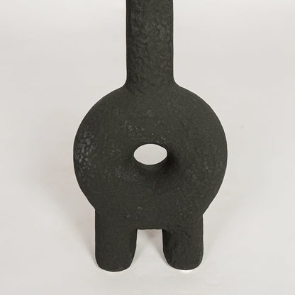 Black ceramic sculptural decorative vase with textured finish perfect for artistic dried floral display and contemporary interior decor.