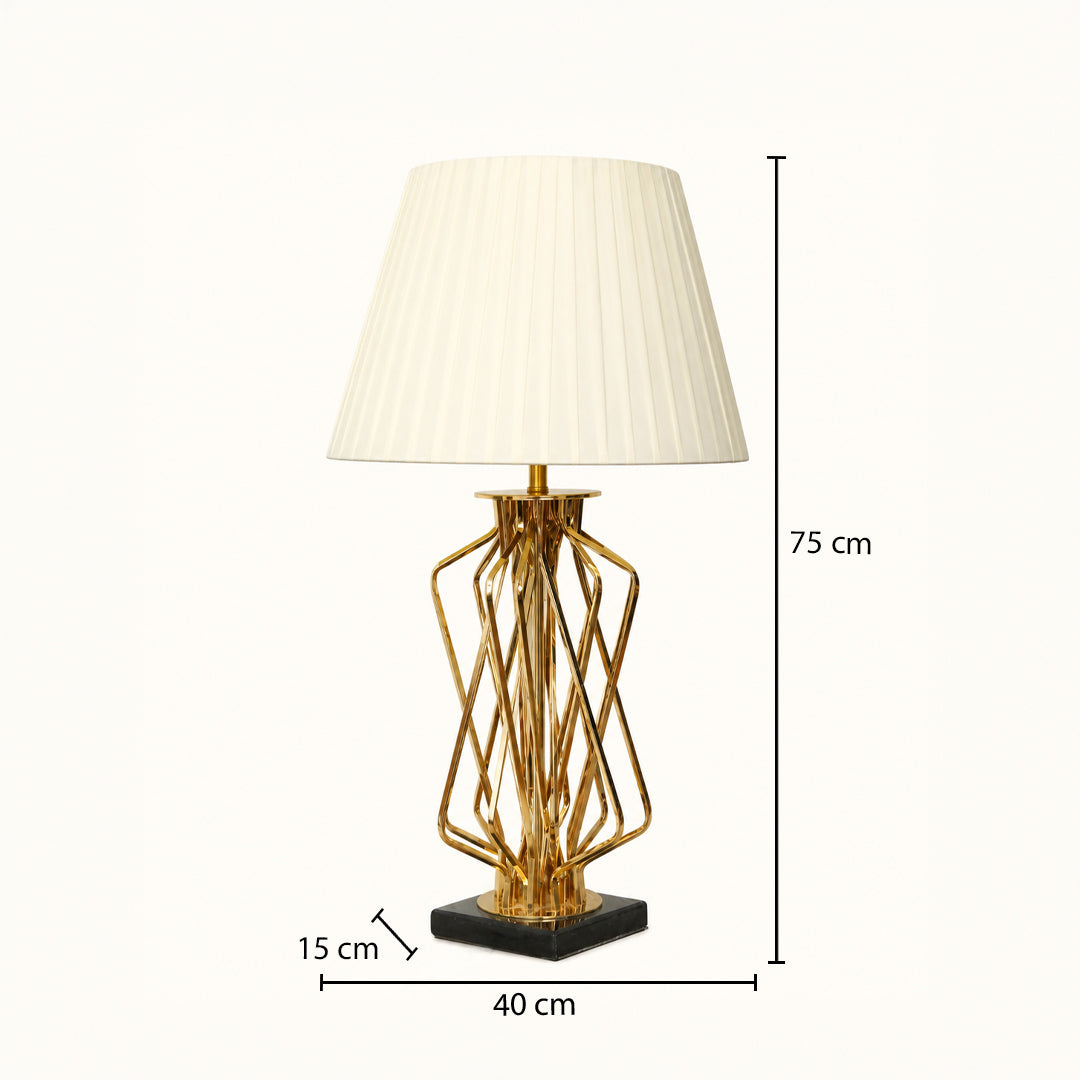 A table lamp with a pleated off-white shade, a gold geometric wire base, and a black square footed pedestal, shown with dimension lines indicating 75 cm height, 40 cm width, and 15 cm base depth.
