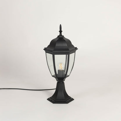 Classic black outdoor pillar lamp with clear glass panels ideal for modern garden patio balcony and driveway lighting.