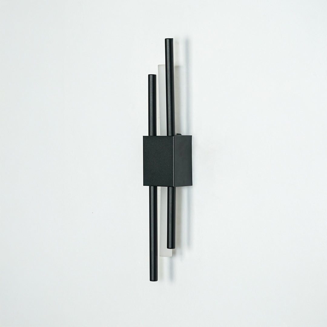 Modern black metal wall light with dual rod design displayed on white background for contemporary home lighting decor.