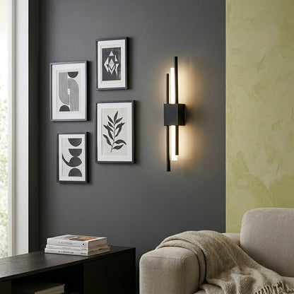 Modern black metal wall light mounted beside sofa on textured wall for luxury living room decor and ambient lighting.