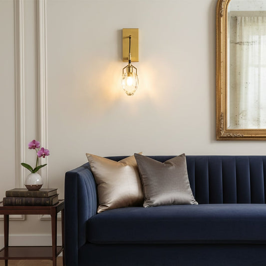 Minimalist gold wall sconce with crystal bulb shown with height 29 cm width 10 cm and depth 12 cm perfect for hallways bedrooms and contemporary décor.