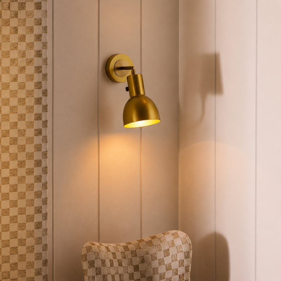 Lifestyle image of gold leonardo metal wall light for elegant hallway decor styling and modern home interior lighting.