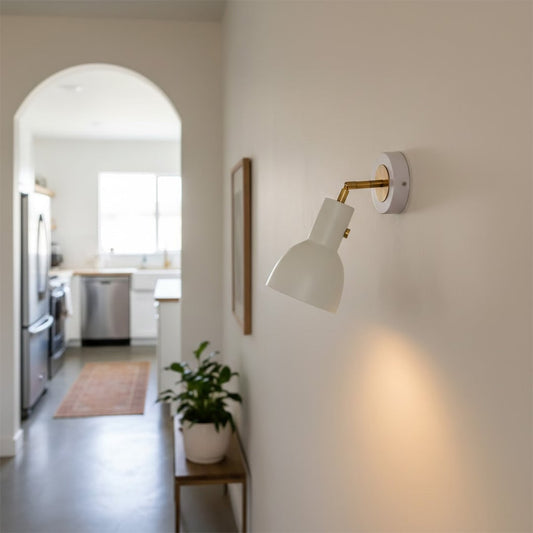 Modern white metal wall light with warm glow for elegant hallway and premium decor styling spaces.

