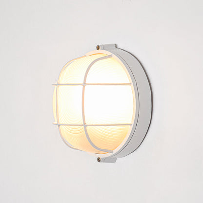 White metal wall light for modern bedroom placement and stylish indoor lighting decor accent with warm glow.