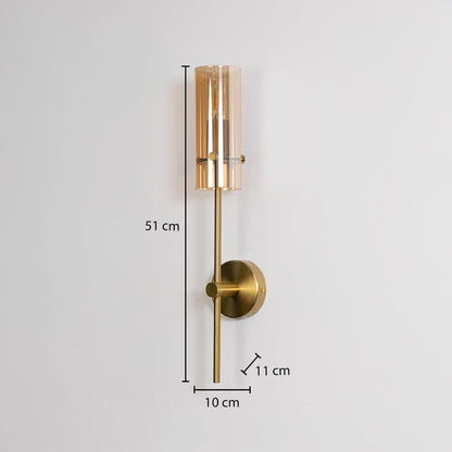 Gold wall light with cylindrical glass shade shown with measurements 51 cm height 10 cm width 11 cm depth for accurate fitting.