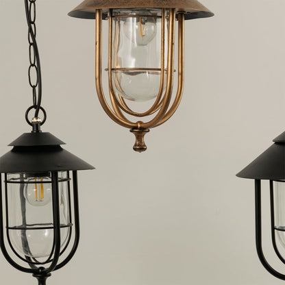 A closeup angle capturing the lantern’s elegant glass enclosure and metal detailing highlighting the design craftwork and refined outdoor aesthetic.