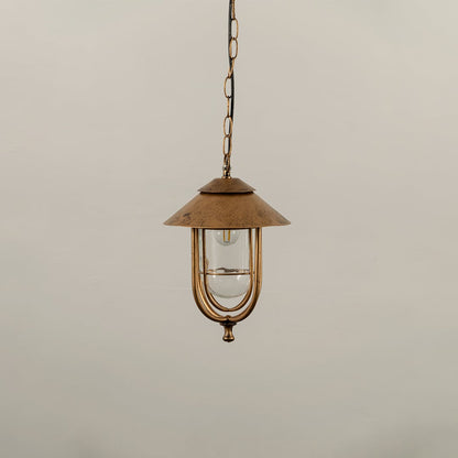 A vintage style hanging lantern with the light off highlighting its metal frame and clear glass body against a white background for a clean product view.