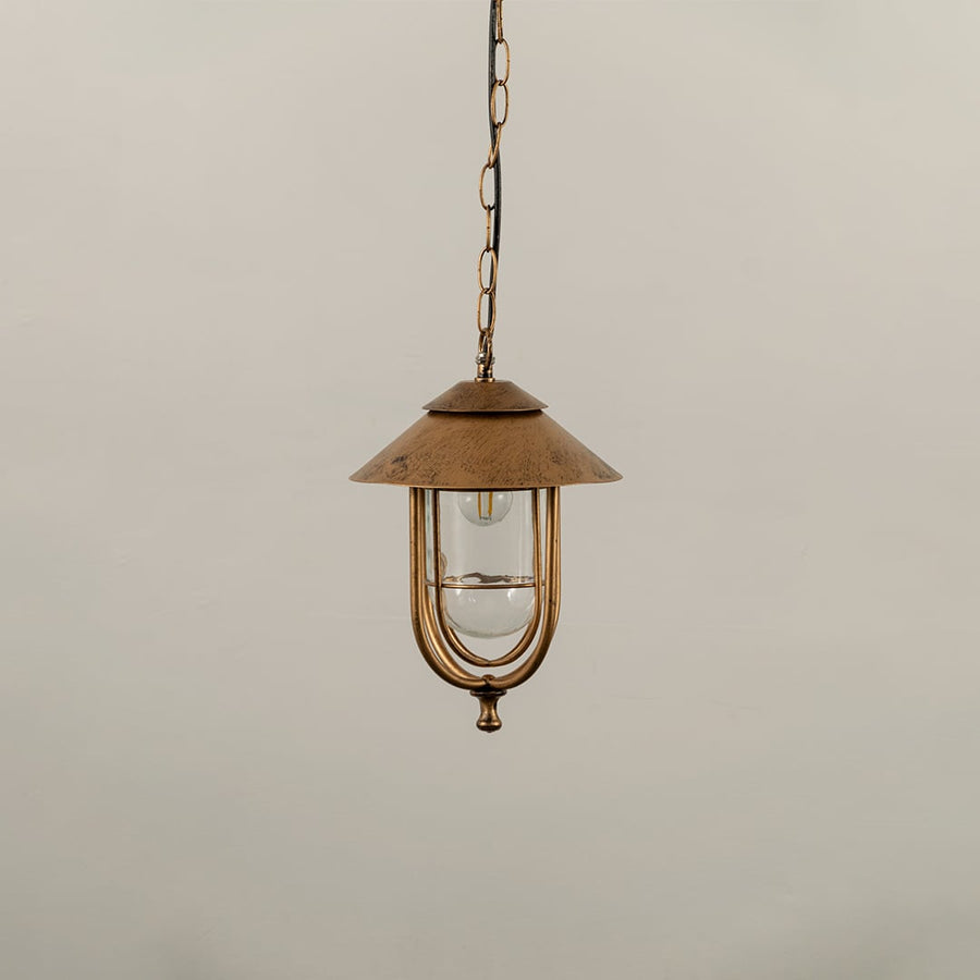 A vintage style hanging lantern with the light off highlighting its metal frame and clear glass body against a white background for a clean product view.