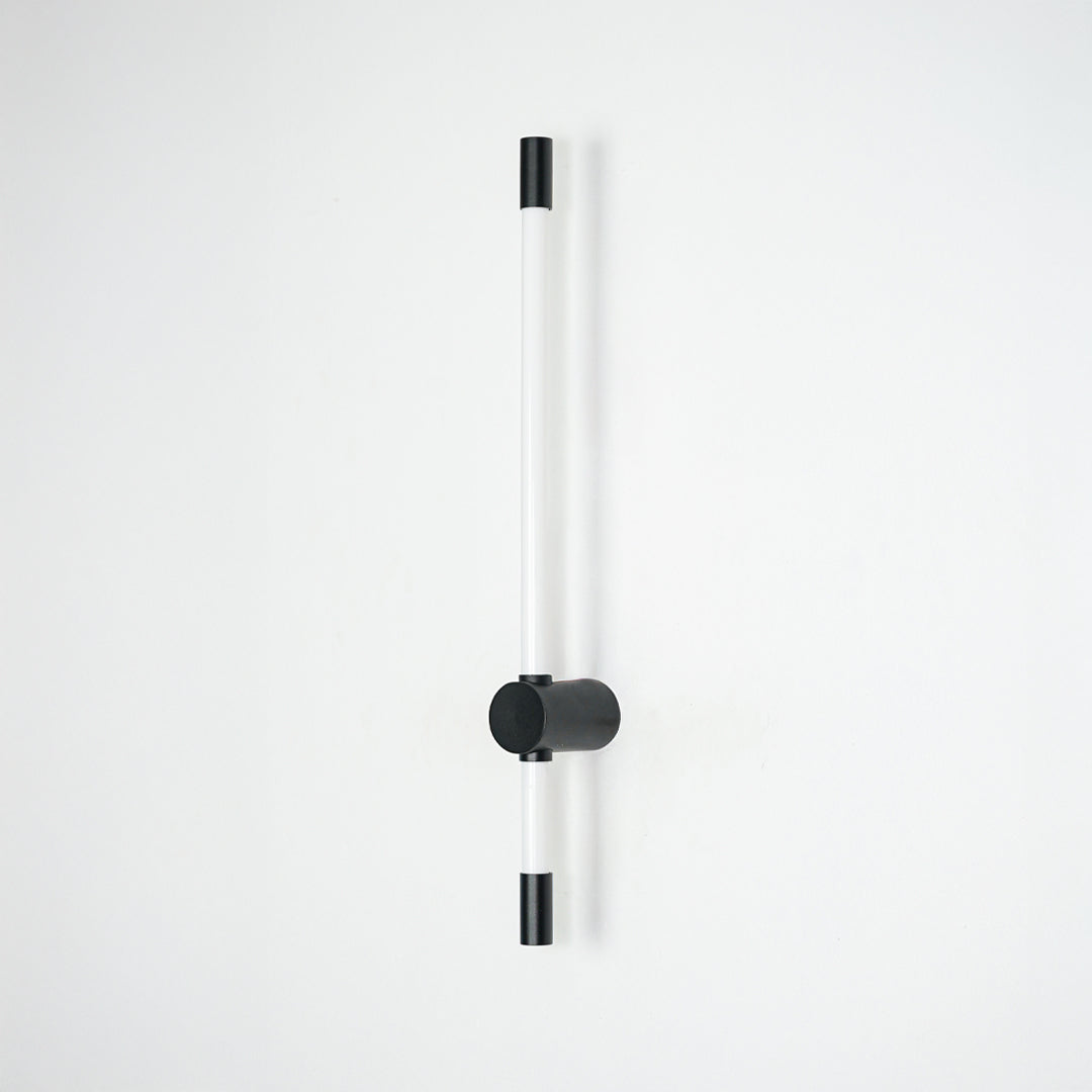 Minimal wall light with vertical tube design and black metal mount ideal for modern bedroom or hallway wall decor on clean background.