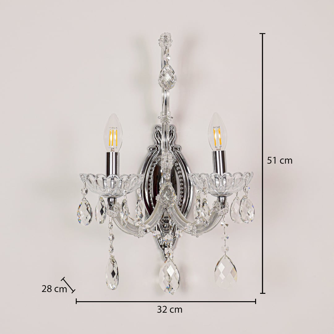 Silver crystal wall light sized 51 cm height and 32 cm width with 28 cm depth ideal for elegant hallway or living room walls.