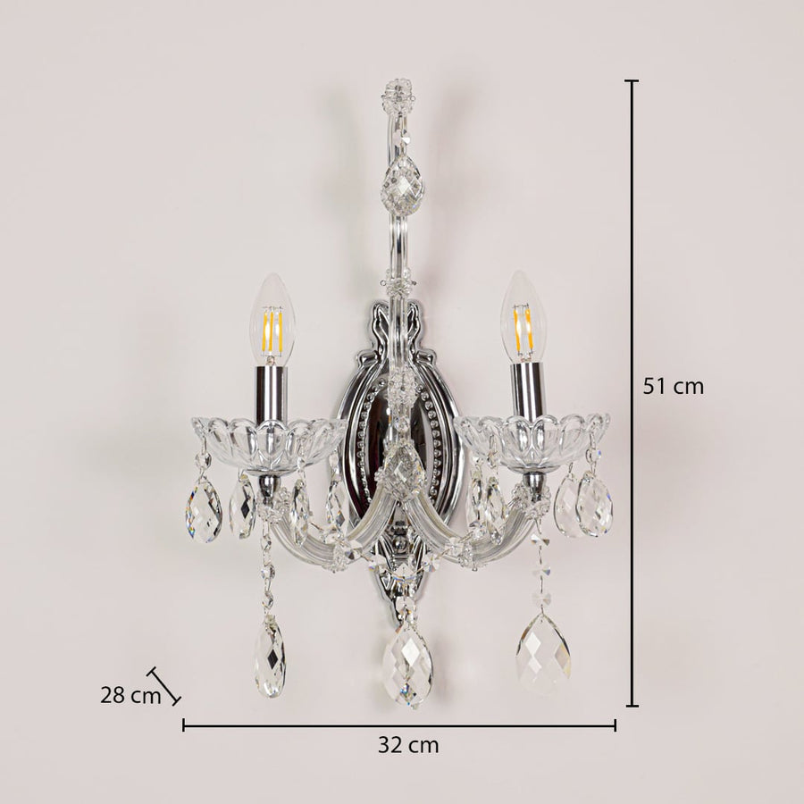 Silver crystal wall light sized 51 cm height and 32 cm width with 28 cm depth ideal for elegant hallway or living room walls.