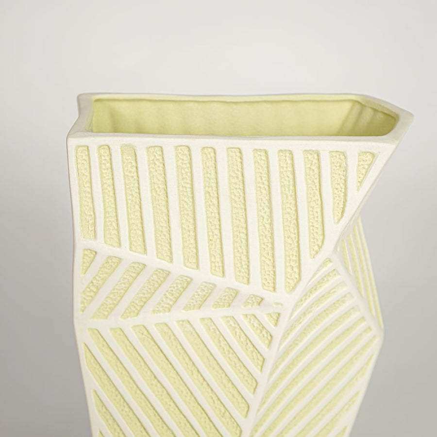 Close view of moss textured ceramic vase medium featuring sculpted organic detailing and refined matte surface.