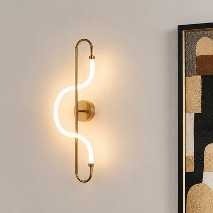 Lifestyle image of gold long acrylic tube wall light for elegant hallway decor styling and modern home interior design.