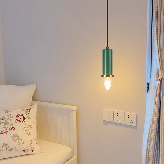Lifestyle image of green long chic pendant light for elegant dining room decor styling and modern home interior design.