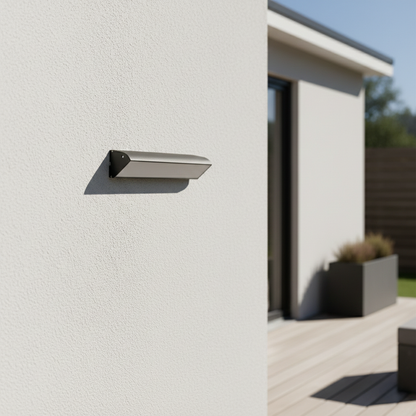 Minimalist silver aluminum outdoor LED wall bar light lifestyle image unlit on a modern concrete deck wall for decor.