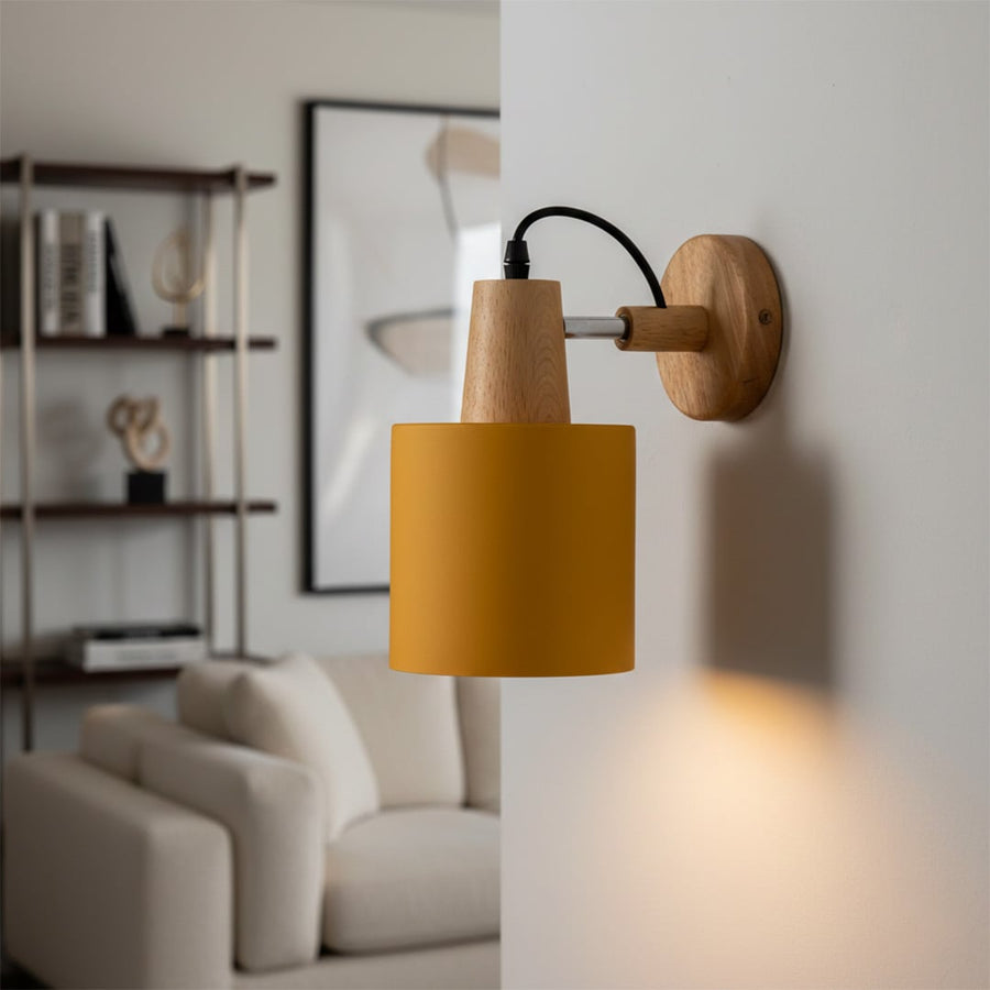 Modern mustard metal and wooden wall light for elegant bedroom and Scandinavian decor styling spaces.
