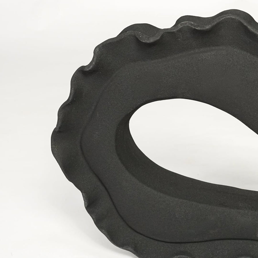 Textured dark grey ceramic abstract art sculpture for elegant shelf and console decor styling.