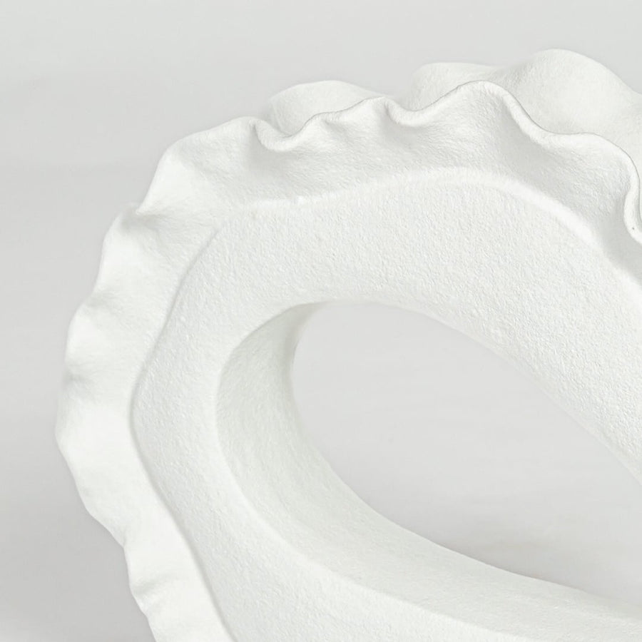 loop white ceramic decorative item closeup