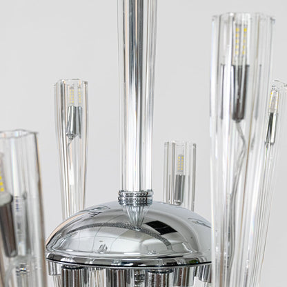 Closeup of modern chrome and clear glass chandelier showing curved arms perfect for stylish contemporary ceiling lighting.