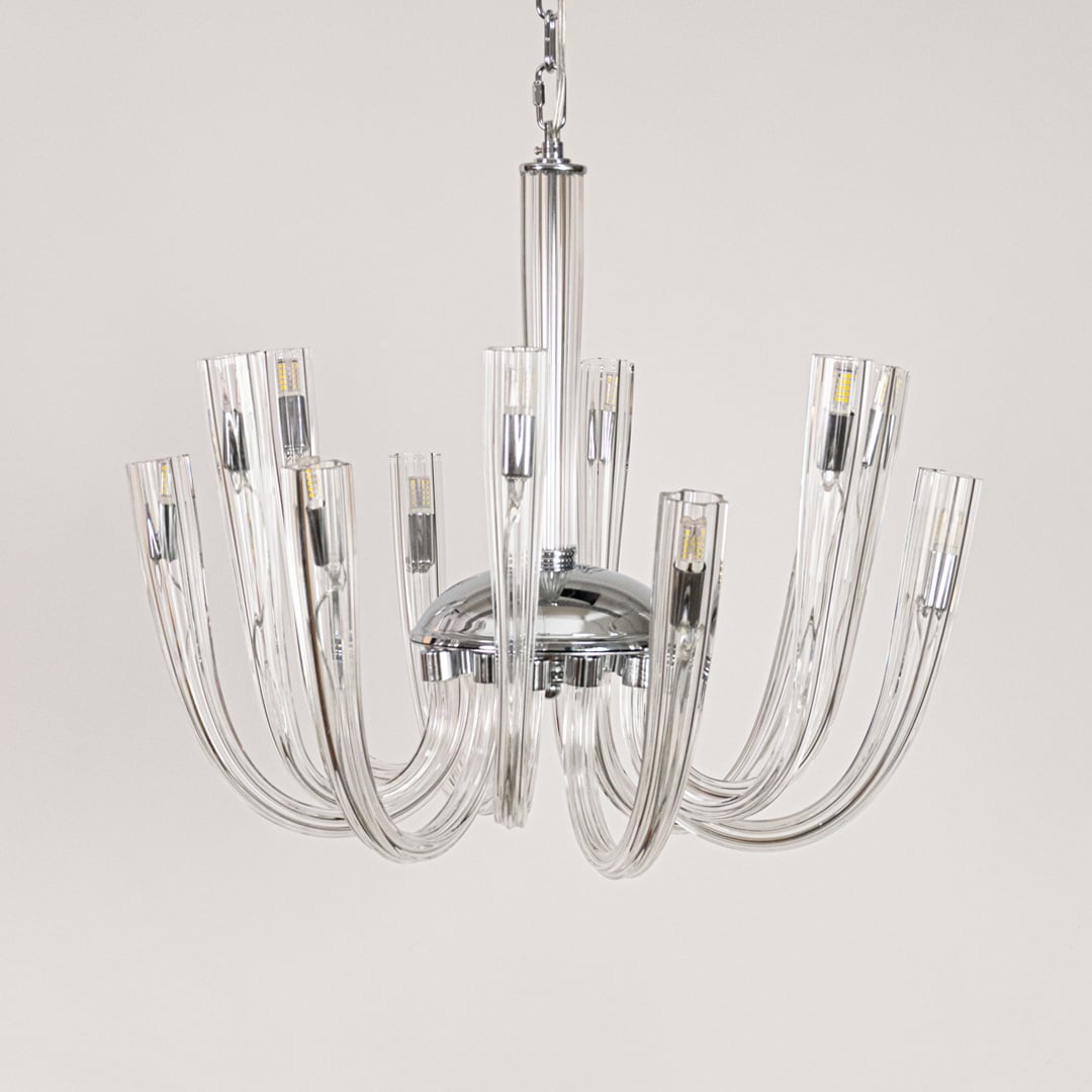 Modern chrome and clear glass chandelier shown on white background ideal for clean and contemporary room ceilings.