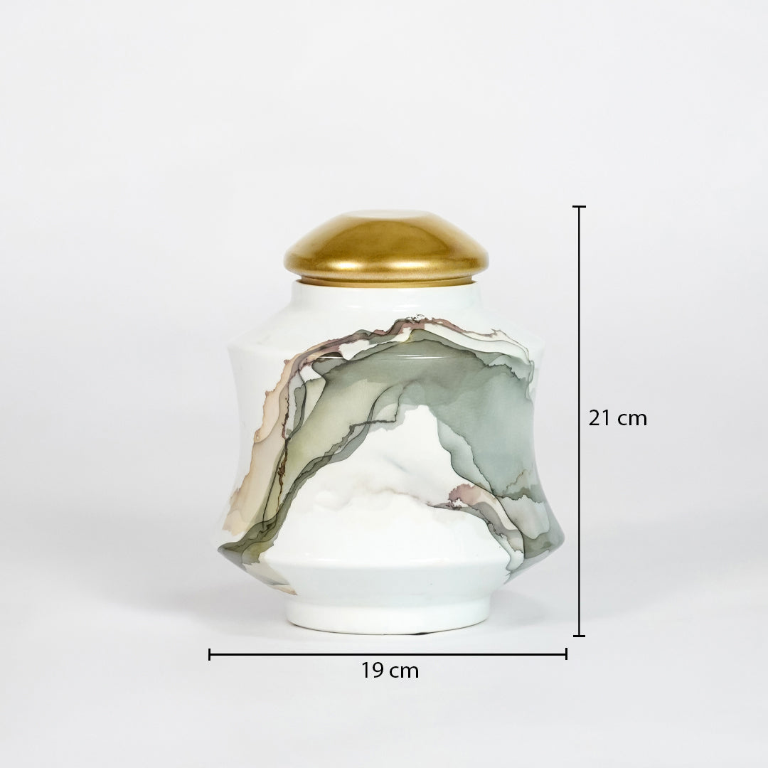 Decorative jar with a gold lid and marbled design, shown with measurements on a white background.
